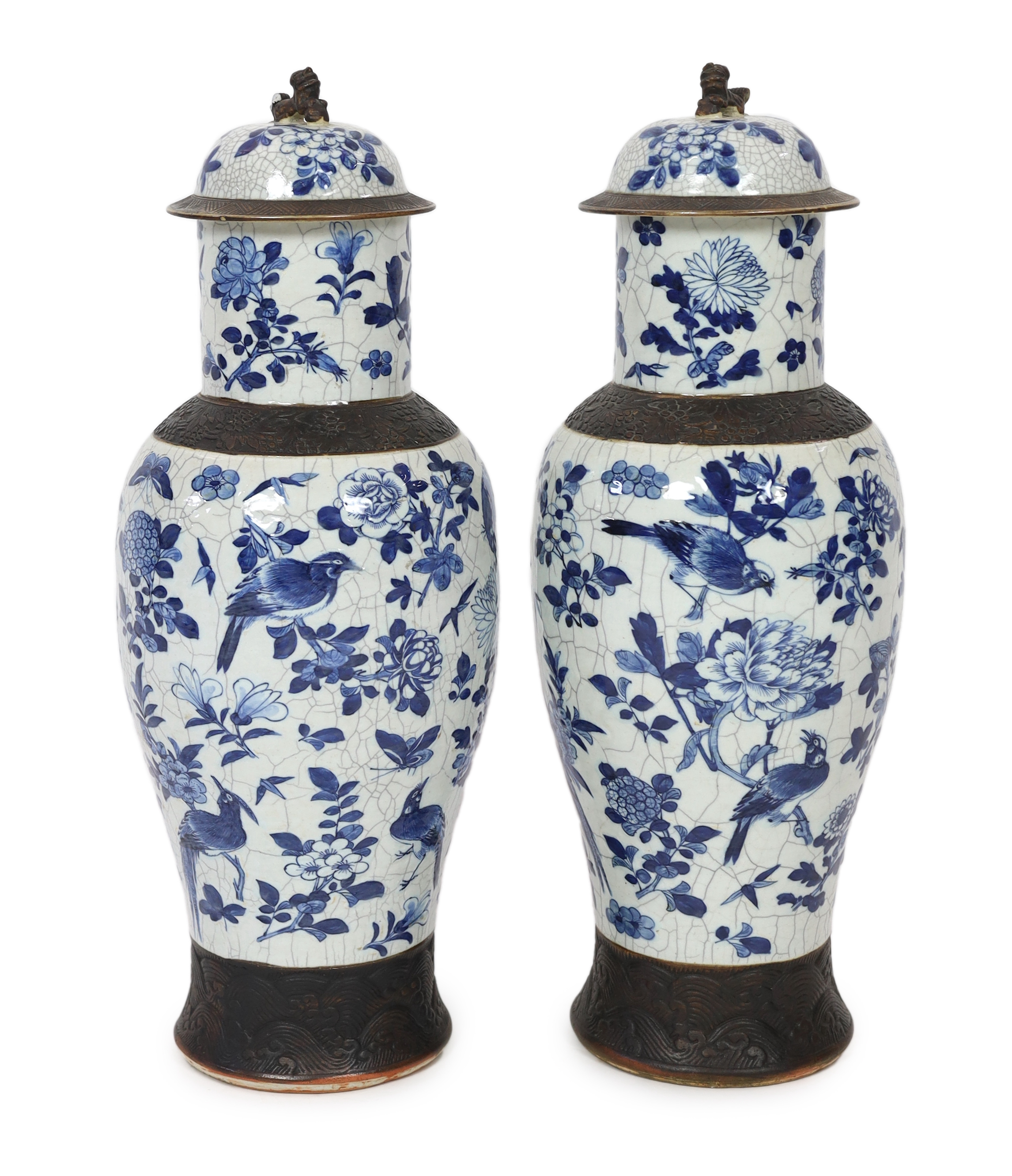 A pair of large Chinese blue and white crackle glaze vases and covers, late 19th century